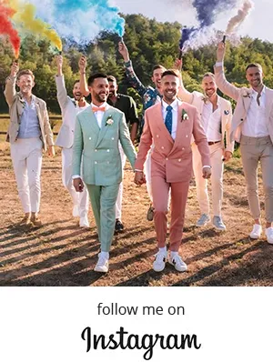 Gay Friendly celebrant for same sex wedding ceremony Barcelona Sitges Catalonia. Gay couple smiling with friendly letting of rainbow smoke