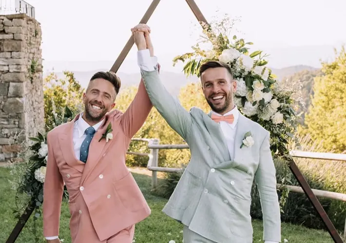 Same-sex wedding in Barcelona with 2 grooms celebrating tying the knot with the help of gay friendly celebrant The Wedding Man